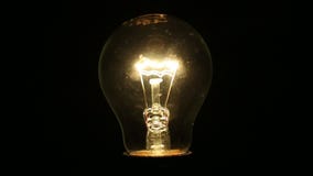 A light bulb illuminates a dark room, much like an idea in our mind
