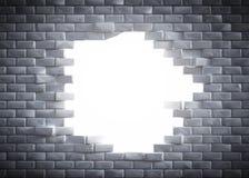 Light coming through a hole in a brick wal stock images Light coming through a hole in a brick wal stock images