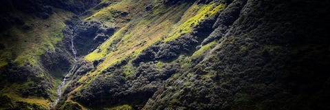 Light revealing mountain river in panoramic landscape Stock Photos Light revealing mountain river in panoramic landscape Stock Photos