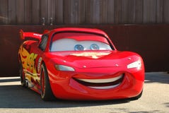 Lightening McQueen from the Pixar movie Cars in a parade at Disneyland, California