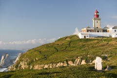 The lighthouse on Cabo da Roca on the Atlantic Ocean in Sintra, Portugal, the westernmost point on the continent of Europe, which Stock Image The lighthouse on Cabo da Roca on the Atlantic Ocean in Sintra, Portugal, the westernmost point on the continent of Europe, which Stock Image