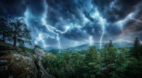 Lightning thunderstorm flash in the mountains. Concept on topic