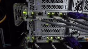 Lights and connections on network server. Working Ethernet switch in data center room. stock video footage Lights and connections on network server. Working Ethernet switch in data center room. stock video footage