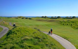 Golf players are enjoying Likya Links Golf course at sunny day in Antalya royalty free stock images Golf players are enjoying Likya Links Golf course at sunny day in Antalya royalty free stock images