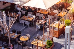 LIMASSOL, CYPRUS - March 18, 2016: People are sitting at the out stock photo LIMASSOL, CYPRUS - March 18, 2016: People are sitting at the out stock photo