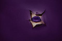 Lips close-up with color lipstick ultra violet in the context of