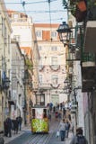 Lisbon, Portugal - 01/03/19: Electric cable tram elevator going up and down on a hill stock photo Lisbon, Portugal - 01/03/19: Electric cable tram elevator going up and down on a hill stock photo