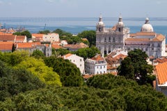 Lisbon Portugal. May 7, 2018. Typical roofs of red tiles in the houses of the city. Catholic cathedral In the distance you can see royalty free stock images Lisbon Portugal. May 7, 2018. Typical roofs of red tiles in the houses of the city. Catholic cathedral In the distance you can see royalty free stock images