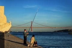 Fishing in the Tagus river at sunset in Lisbon royalty free stock images Fishing in the Tagus river at sunset in Lisbon royalty free stock images