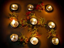 Lit Diya On Hindu Religious Floral Pattern Stock Images
