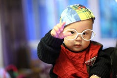 Little Baby Boy In The Big Glasses Royalty Free Stock Photography