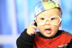 Little Baby Boy In The Big Glasses Stock Photos