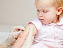 Little baby girl gets an injection stock images Little baby girl gets an injection stock images