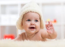 Little baby girl weared in white hat stock photo Little baby girl weared in white hat stock photo