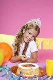 Little blond girl in a birthday party