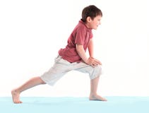 Little boy does morning exercises.isolated on white background royalty free stock photography Little boy does morning exercises.isolated on white background royalty free stock photography