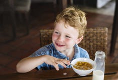 Little boy at a hotel breakfast stock images Little boy at a hotel breakfast stock images