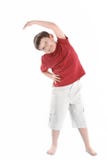 Little boy performs an exercise to stretch the muscles.isolated on white stock photography Little boy performs an exercise to stretch the muscles.isolated on white stock photography