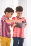 Little Boy Playing Tablet At Home Royalty Free Stock Images Little Boy Playing Tablet At Home Royalty Free Stock Images