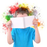 Little Boy Reading Art Book with Paint on White stock images Little Boy Reading Art Book with Paint on White stock images