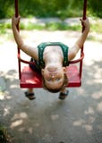 Little Boy Sitting On A Swing Stock Photography Little Boy Sitting On A Swing Stock Photography