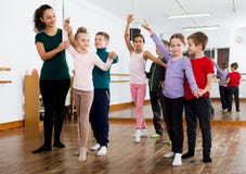 Little boys and girls having dancing Royalty Free Stock Photography Little boys and girls having dancing Royalty Free Stock Photography