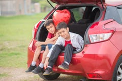 Little boys giving balloon heart to his mother love stock image Little boys giving balloon heart to his mother love stock image