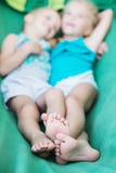 Little children are hugging on a hammock royalty free stock photography Little children are hugging on a hammock royalty free stock photography
