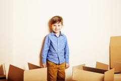 Little Cute Boy In Empty Room, Remoove To New House. Home Alone Stock Photography