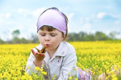 Little Cute Girl With A Butterfly. Stock Images