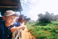 Little expiorer boy with his father on jeep safari royalty free stock images Little expiorer boy with his father on jeep safari royalty free stock images