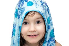 Little girl after bath, on her head lies towel, smiling, portrait royalty free stock image Little girl after bath, on her head lies towel, smiling, portrait royalty free stock image