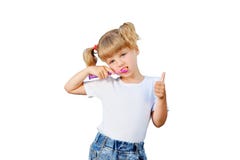 A little girl is brushing her teeth stock photos A little girl is brushing her teeth stock photos