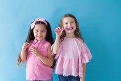 Little girl brushing his teeth with a toothbrush dent stock image Little girl brushing his teeth with a toothbrush dent stock image
