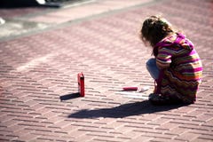 Little Girl Draws At The Street Royalty Free Stock Photography Little Girl Draws At The Street Royalty Free Stock Photography
