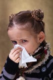Little girl in flu season - blowing nose royalty free stock photos Little girl in flu season - blowing nose royalty free stock photos