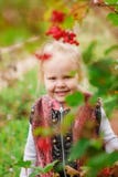 Little girl hiding behind the foliage Royalty Free Stock Images Little girl hiding behind the foliage Royalty Free Stock Images