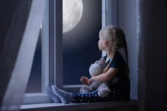 Little Girl Looking At The Starry Sky And Moon Stock Photo Little Girl Looking At The Starry Sky And Moon Stock Photo