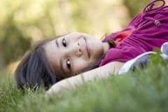 Little Girl Lying On Grass Royalty Free Stock Image Little Girl Lying On Grass Royalty Free Stock Image