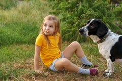 Little girl and mongrel dog outdoors royalty free stock images Little girl and mongrel dog outdoors royalty free stock images