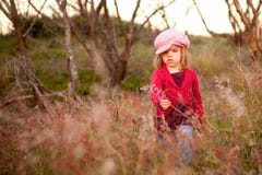 Little Girl Picking Flowers In A Field Stock Image Little Girl Picking Flowers In A Field Stock Image