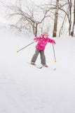 Little Girl Sliding Down Hill On Ski Royalty Free Stock Images