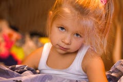 Little Girl Smiling And Playing In Bed, Evening Stock Image Little Girl Smiling And Playing In Bed, Evening Stock Image