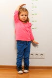 Little girl wants to grow up fast as she can stock photos Little girl wants to grow up fast as she can stock photos