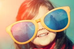 Little Girl With Big Sunglasses Royalty Free Stock Image