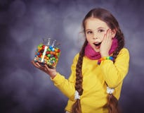 Little Girl With Jelly Bean. Stock Photo