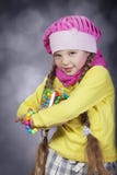 Little Girl With Jelly Bean. Royalty Free Stock Photo