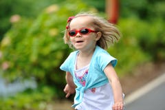 Little Girl With Sunglasses Royalty Free Stock Images