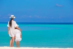 Little girl and young mother during beach vacation stock photography Little girl and young mother during beach vacation stock photography