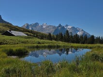 Little Lake And Mountain Range Stock Photo